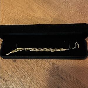 Elegant Gold Braided Bracelet